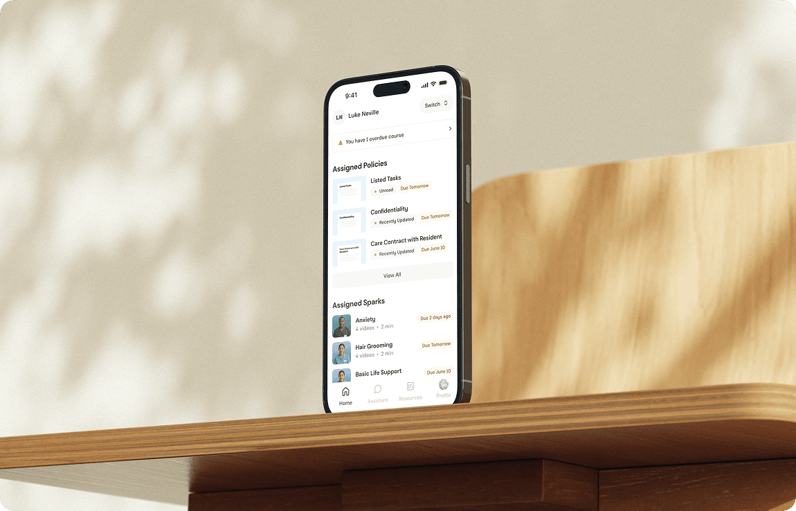 Boost Digital Assistant on a mobile phone standing on a desk